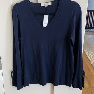 Loft. NWT navy blue v neck top with bell sleeves size M